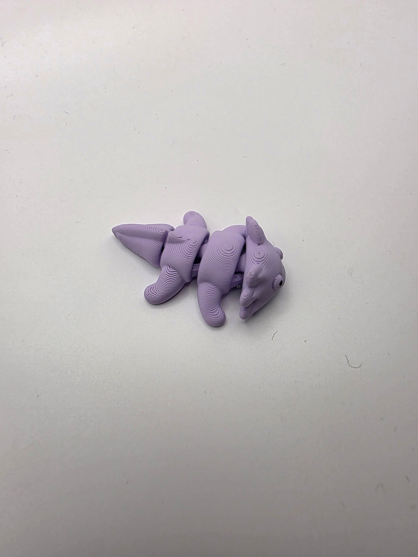 Small articulating purple Axolotl