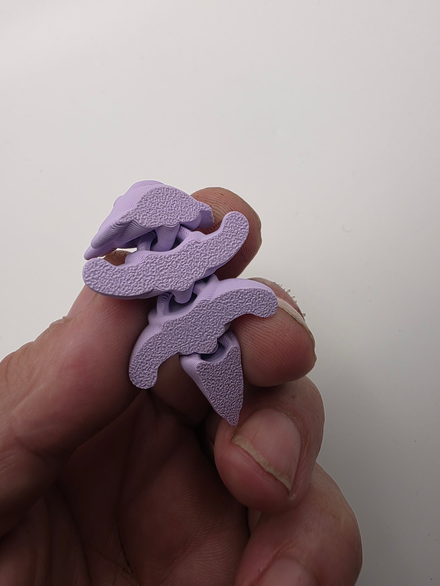 Small articulating purple Axolotl