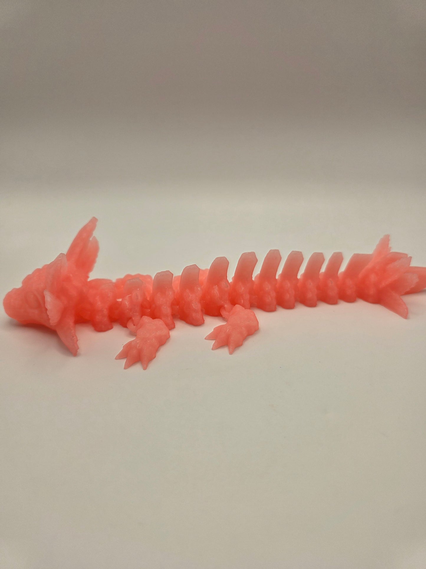 Baby Axolotl (glow in the dark) pink