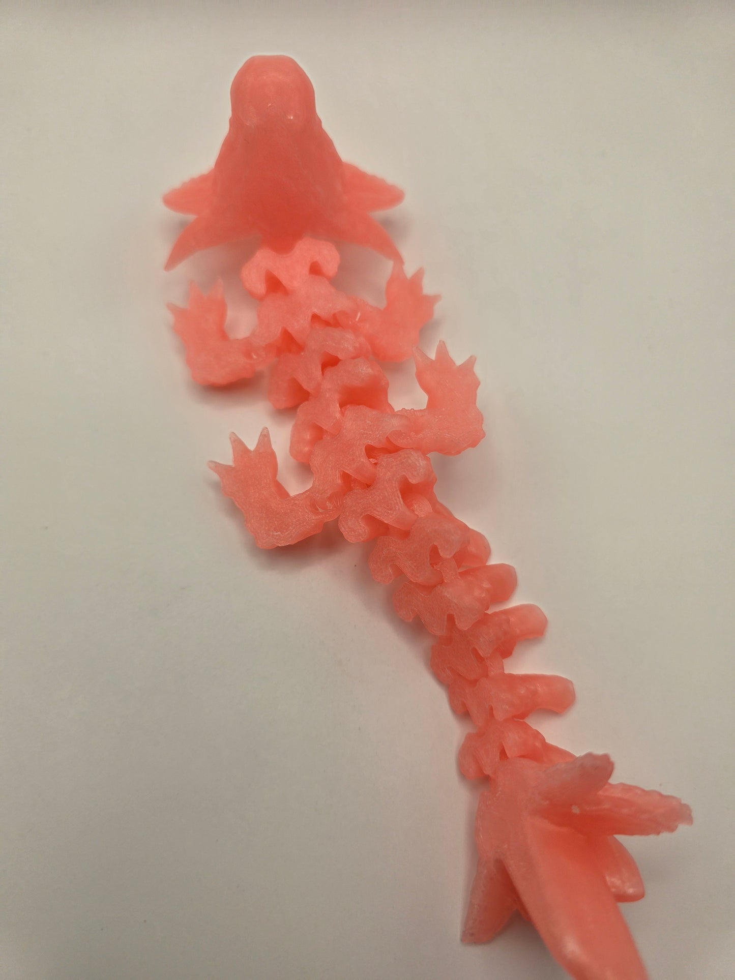 Baby Axolotl (glow in the dark) pink