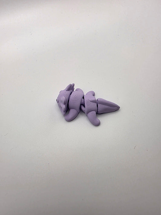 Small articulating purple Axolotl