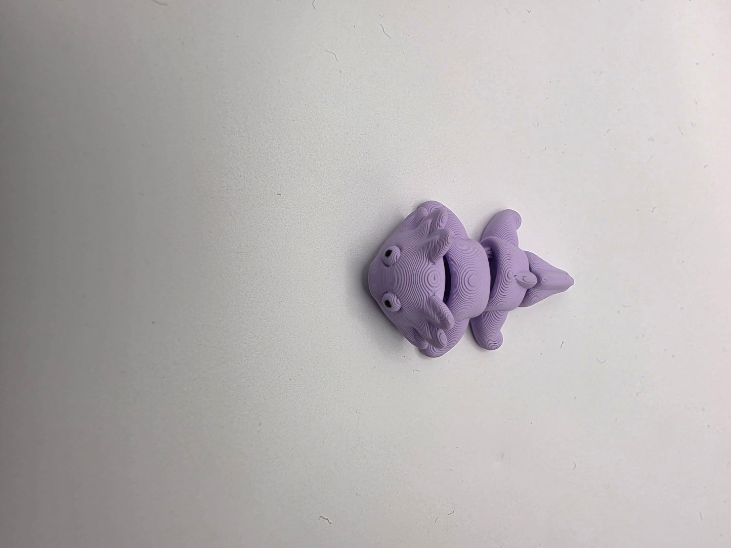 Small articulating purple Axolotl