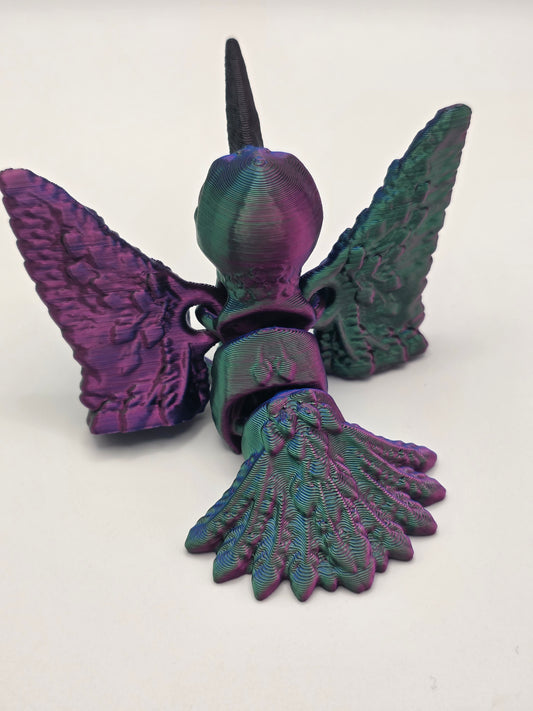 Hummingbird (articulating) vibrant red, green, and blue tri-color.