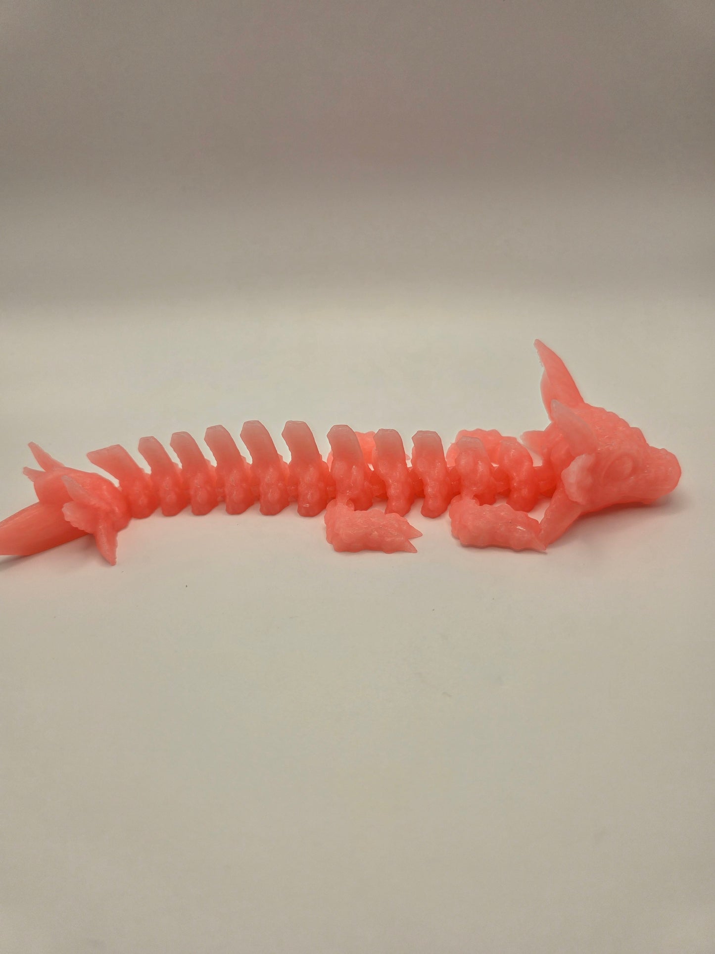 Baby Axolotl (glow in the dark) pink