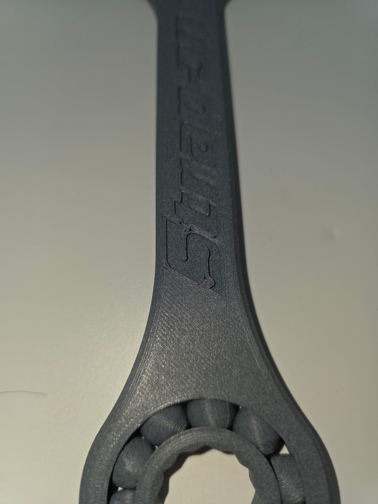 Carbon fiber spinner wrench