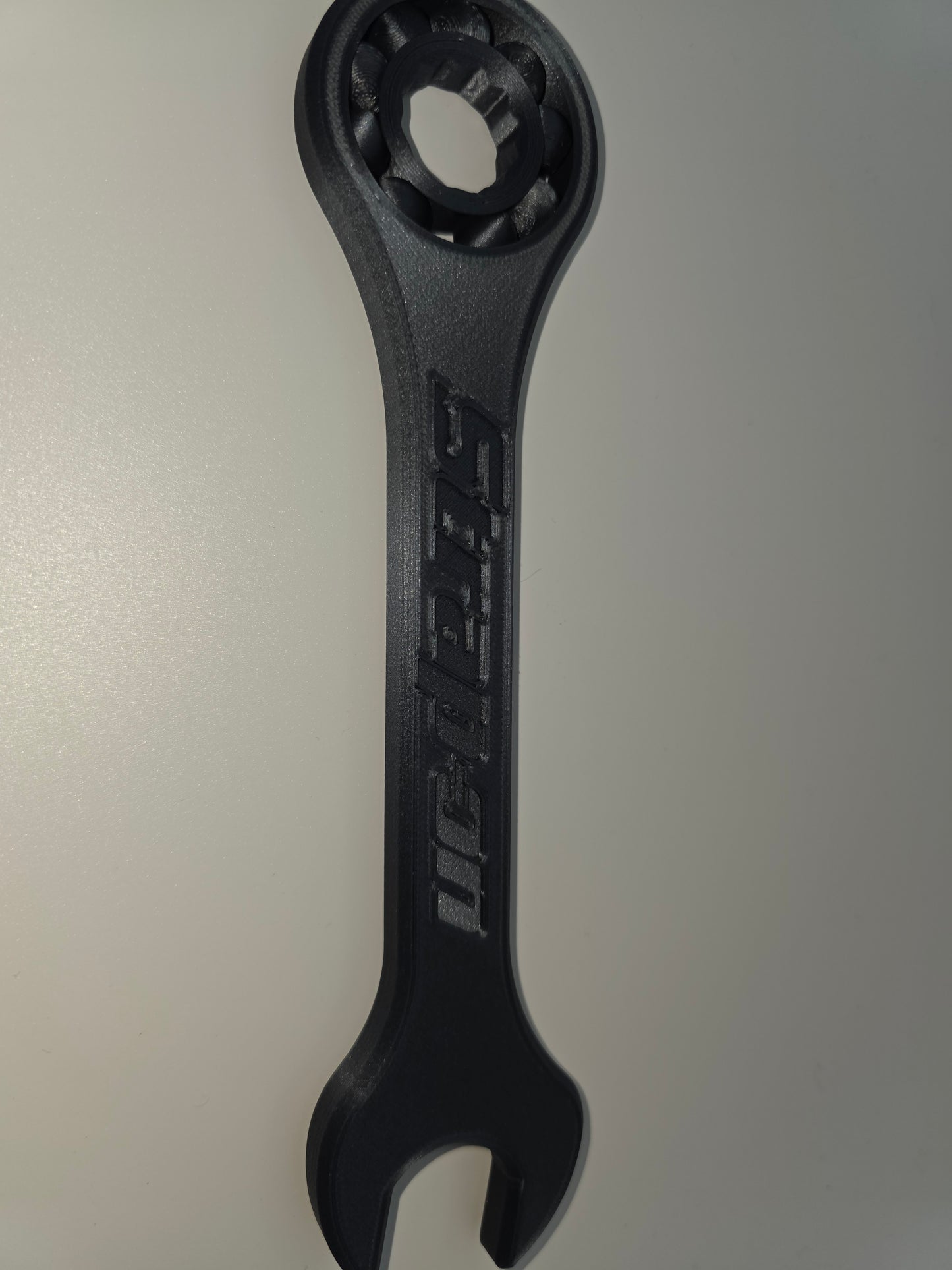 Carbon fiber spinner wrench